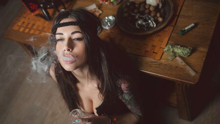 brunette girl smoking bong