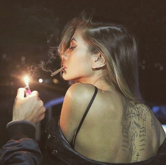 beautiful girl smoking joint