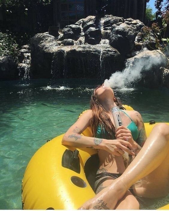 girl in bikini smoking bong