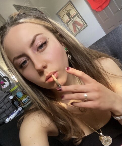 girl smoking cannabis joint