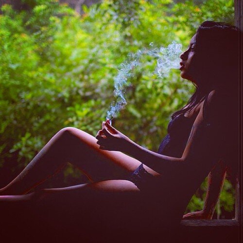 girl smoking weed outside