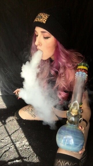 pink haired girl smoking bong