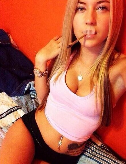 pretty blonde chick smoking weed