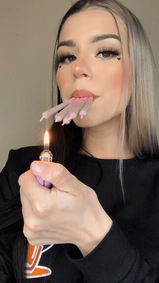 pretty blonde girl smoking weed