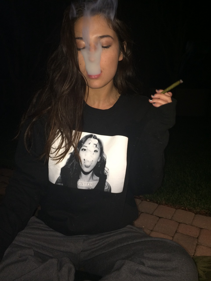 pretty girl smoking marijuana joint